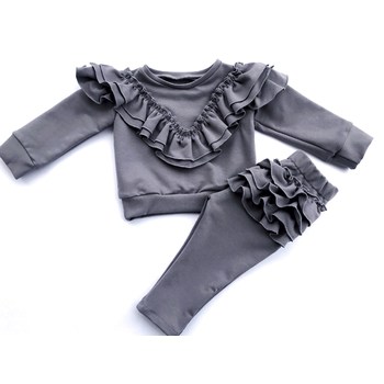 Tracksuit with sewn-on, pointed frills