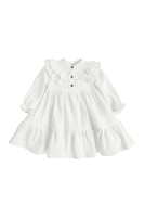 Muslin dress with a ruffle