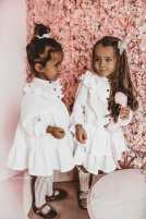 Muslin dress with a ruffle