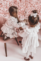 Muslin dress with a ruffle