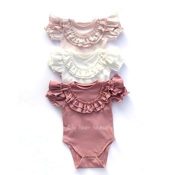 Bodysuit with sewn-on frills on the chest and shoulders